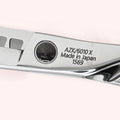 Aura 6010 6" Japanese handmade hair shear – close-up of back engraving