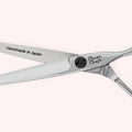 Titan Slim 6.0 Japanese handmade hair shear – close-up of open blades and engraving