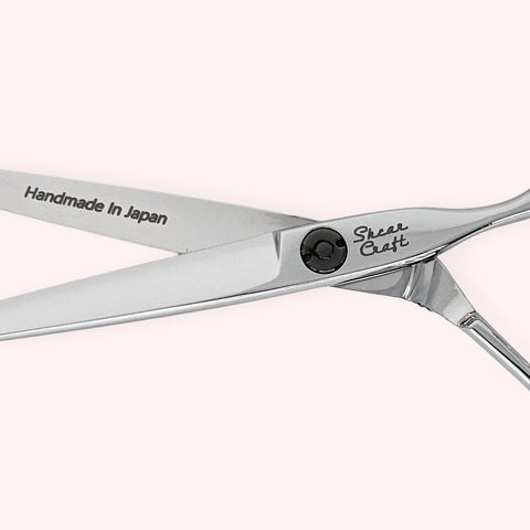 Titan Slim 6.0 Japanese handmade hair shear – close-up of open blades and engraving
